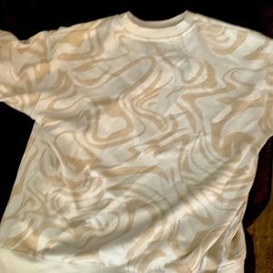 White sweater and Baigent decal sweater